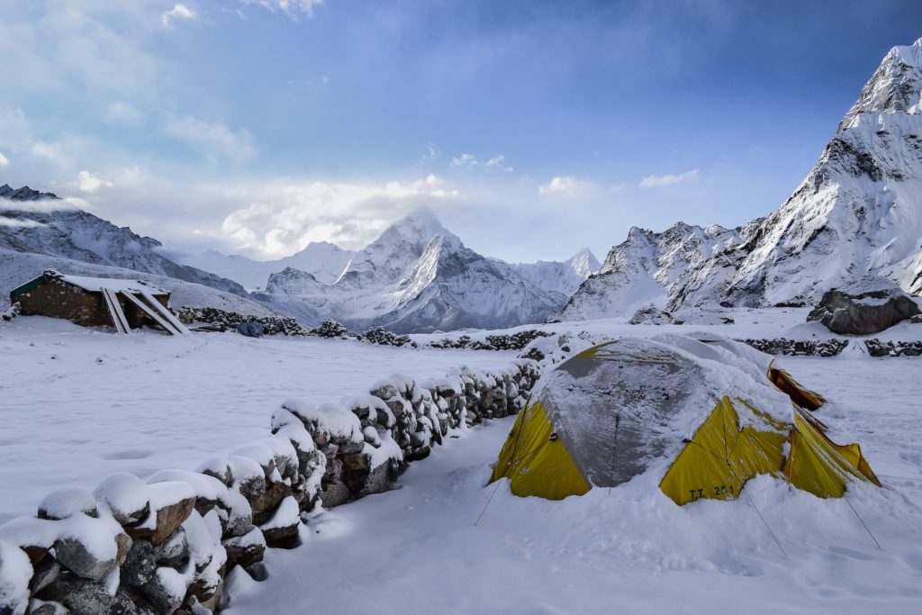 Another cold weather camping tip is block your tent form the wind